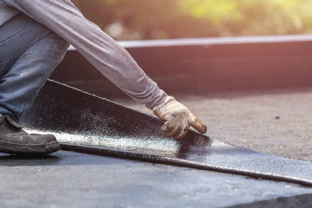 Professional Exterior Waterproofing technician working in Brooksville, KY
